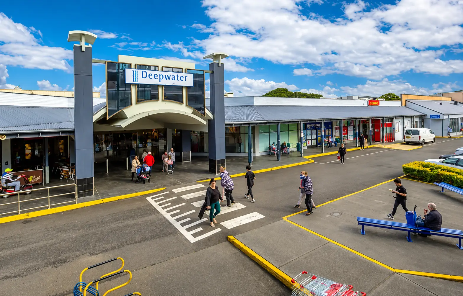 Deepwater Plaza shopping centre exterior with pedestrian crossings and shoppers